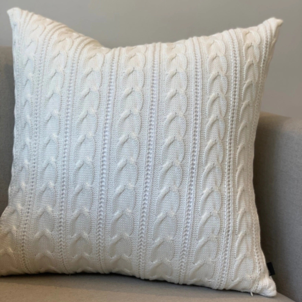 Almofada em tricot para deixar o ambiente mais aconchegante e sofisticado.