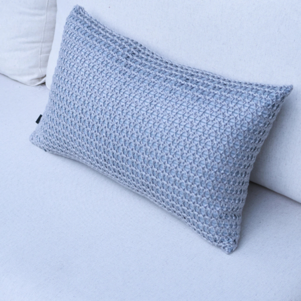 Almofada em tricot para deixar o ambiente mais aconchegante e sofisticado.