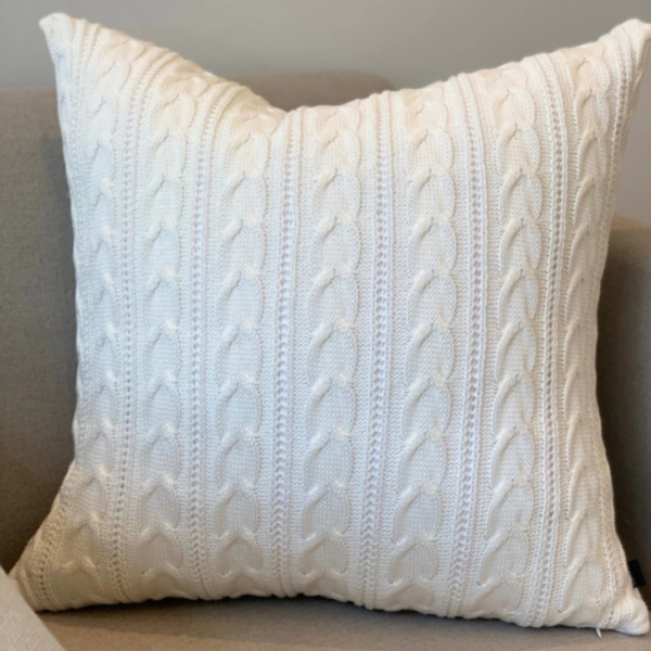 Almofada em tricot para deixar o ambiente mais aconchegante e sofisticado.