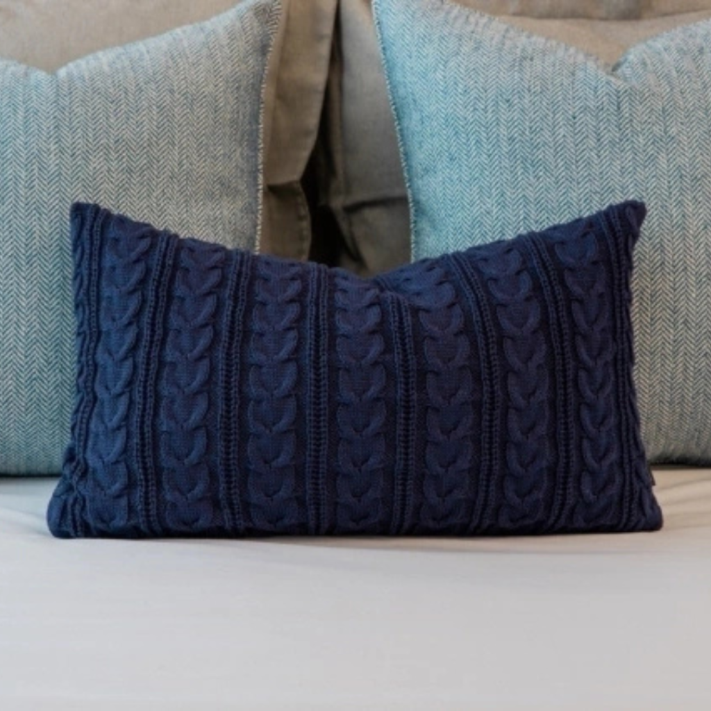 Almofada em tricot para deixar o ambiente mais aconchegante e sofisticado.