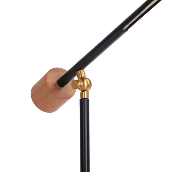 Luminária de mesa feita em madeira e metal com iluminação linear que trás um toque charmoso para esta luminária. Peça de design elegante que agrega um diferencial a decoração. Desenvolvido e fabricado nacionalmente pela Modali Design.